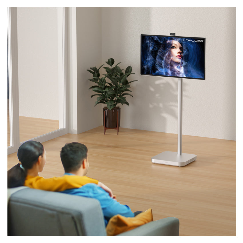 Couple watching content on LC-M32S4K NEXT2U 31.5" 4K mobile smart monitor in a modern living room.